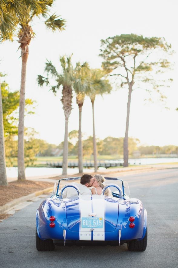 Callie & Roy in a convertible 