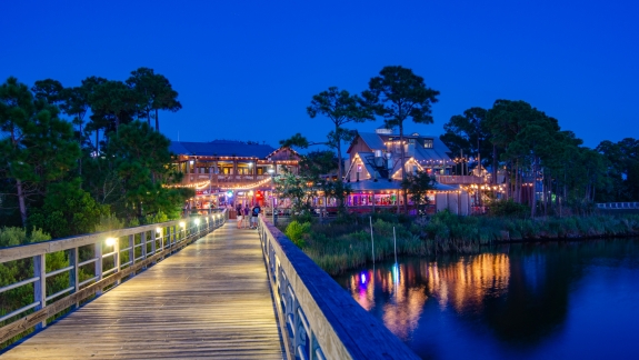 The village of Baytowne Wharf seen at night.