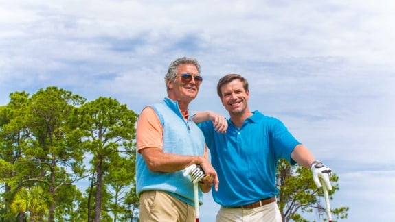 Men playing golf