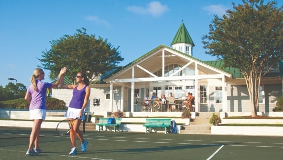 Women playing tennis