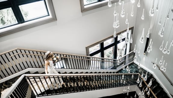 bride descending stairs