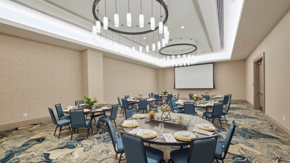 The Elderberry ballroom at Hotel Effie set up for a presentation.