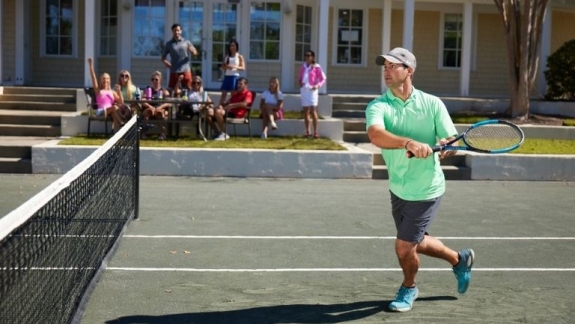Tennis match with crowd cheer