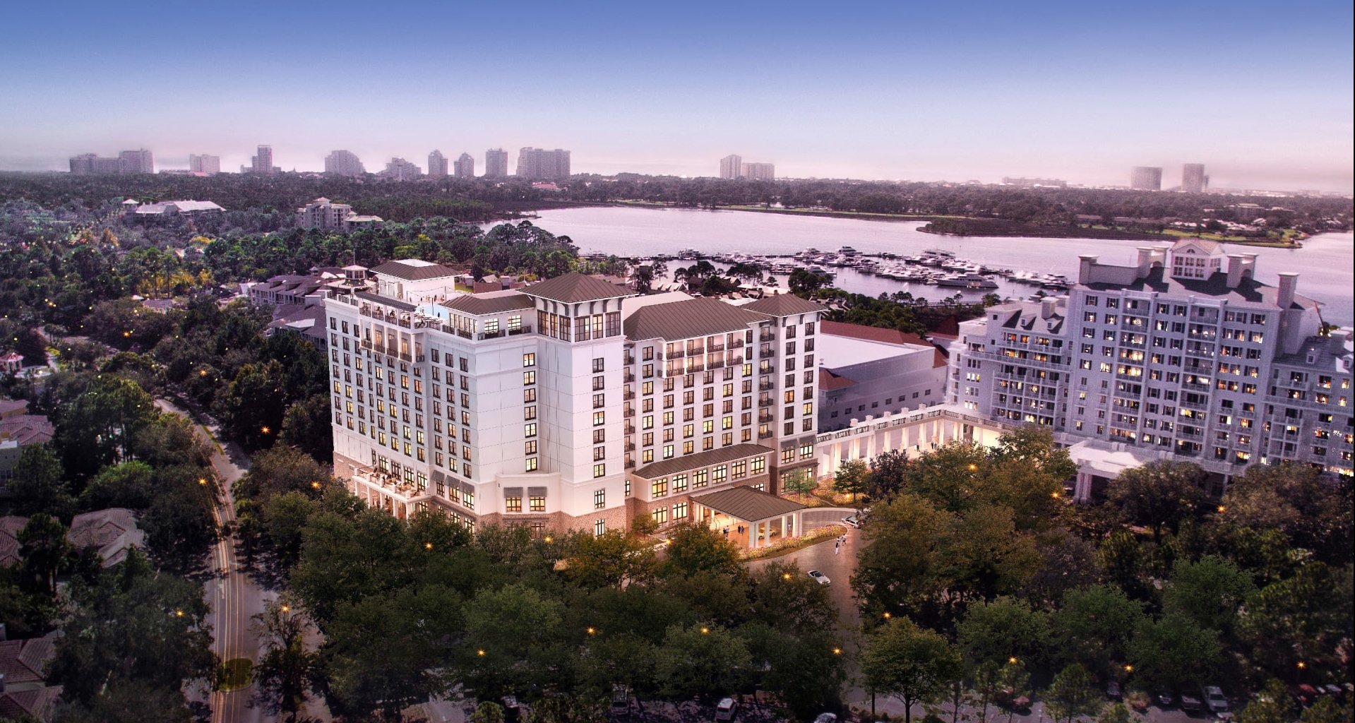 An aerial view of Hotel Effie surrounded by trees.