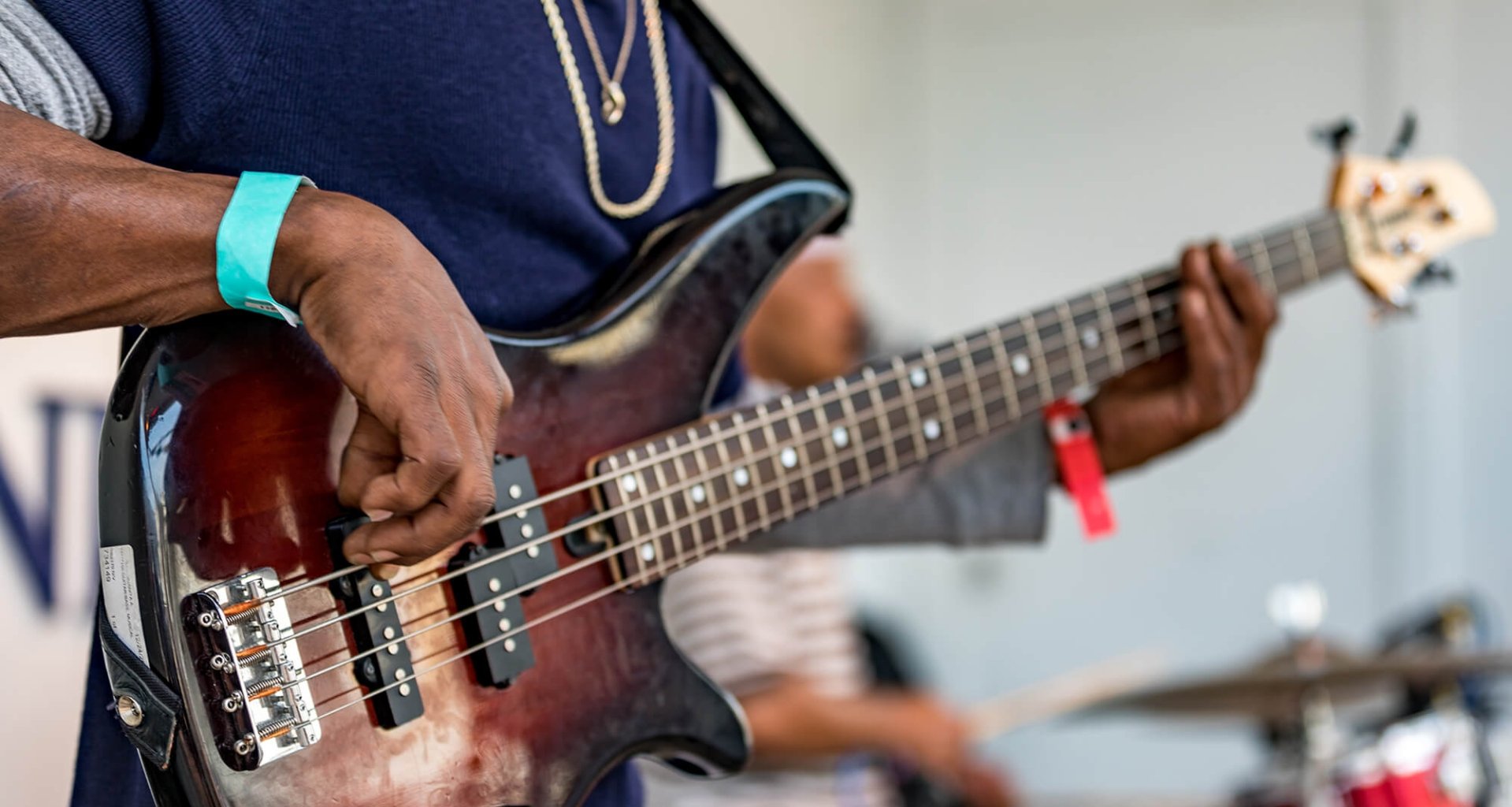 Man playing a base guitar 