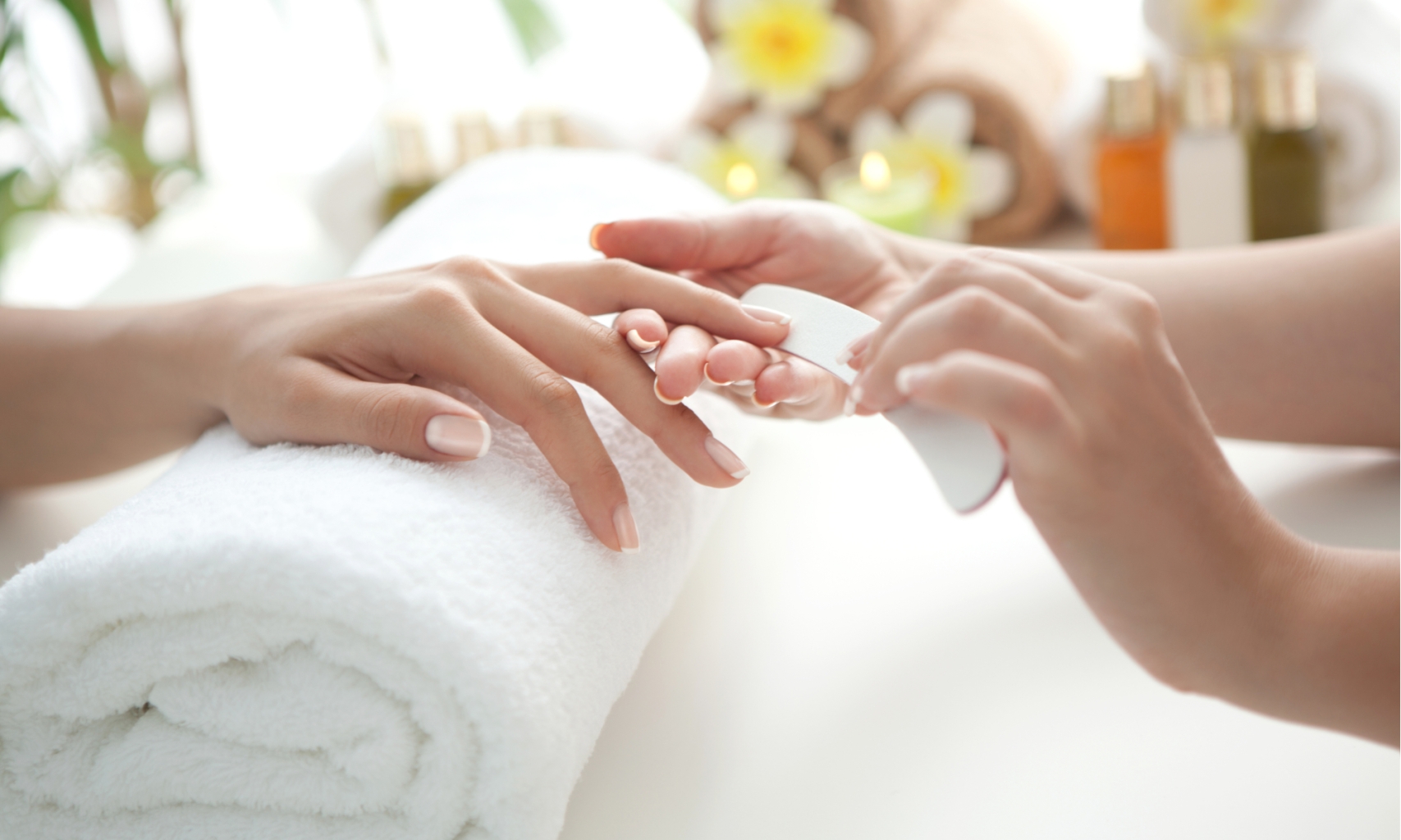 A woman getting her nails done