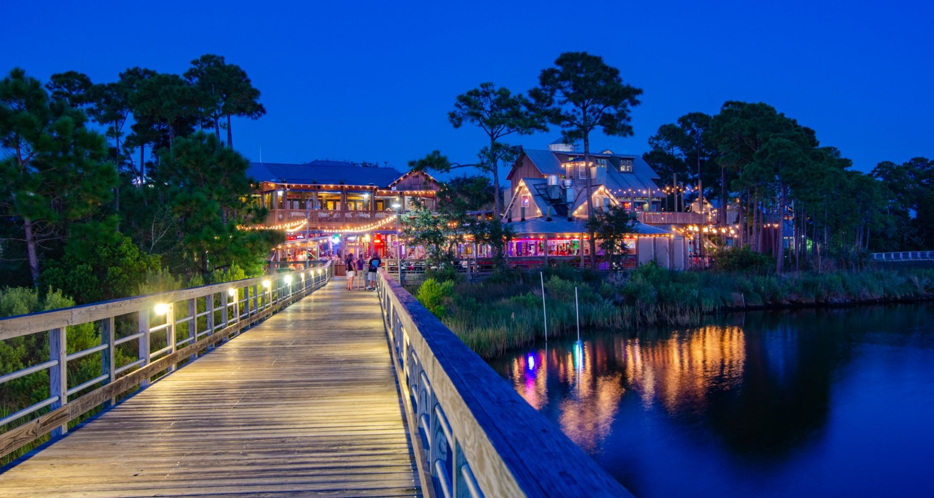 The village of Baytowne Wharf seen at night.