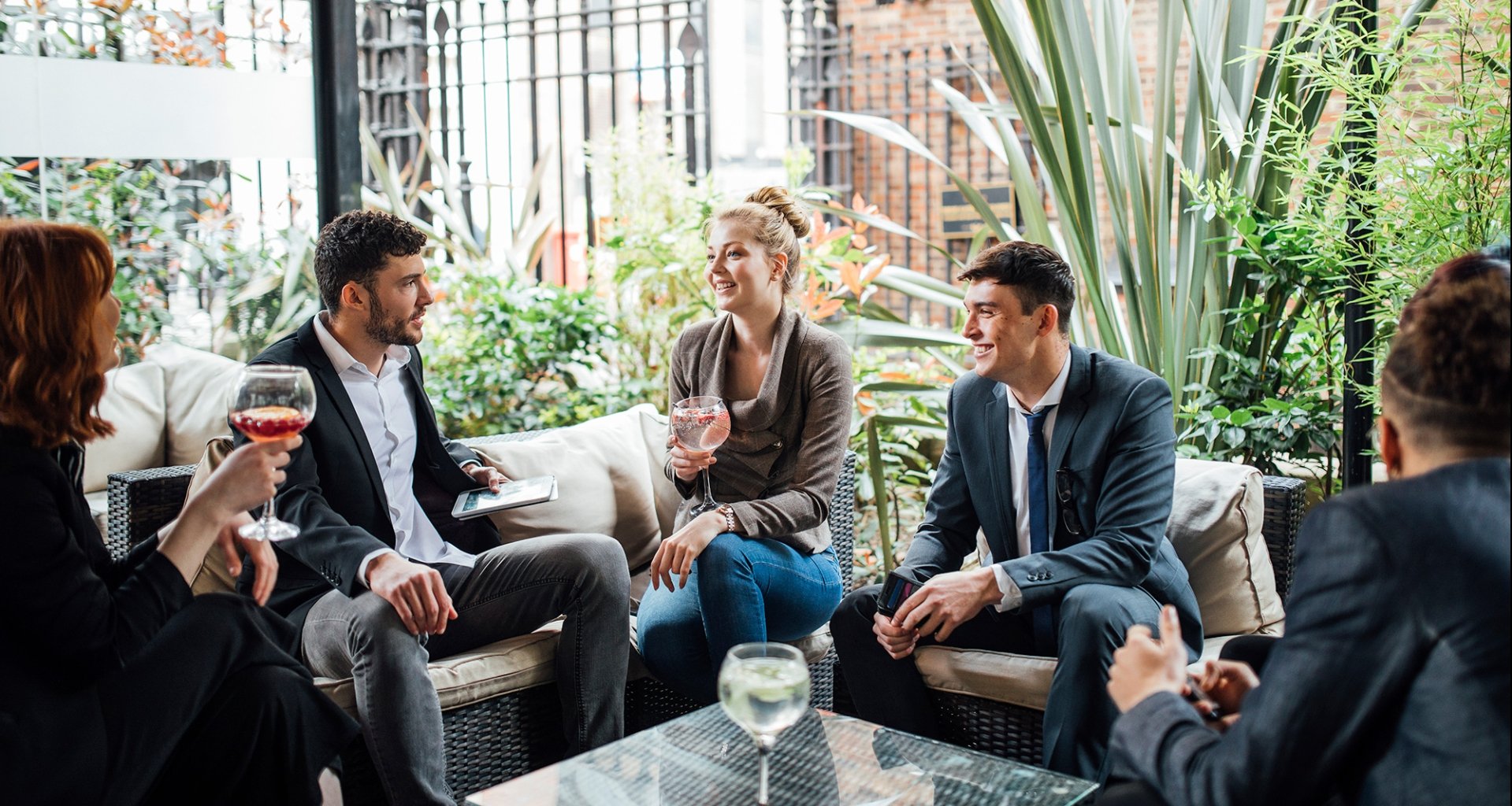 a group of young professionals having a meeting