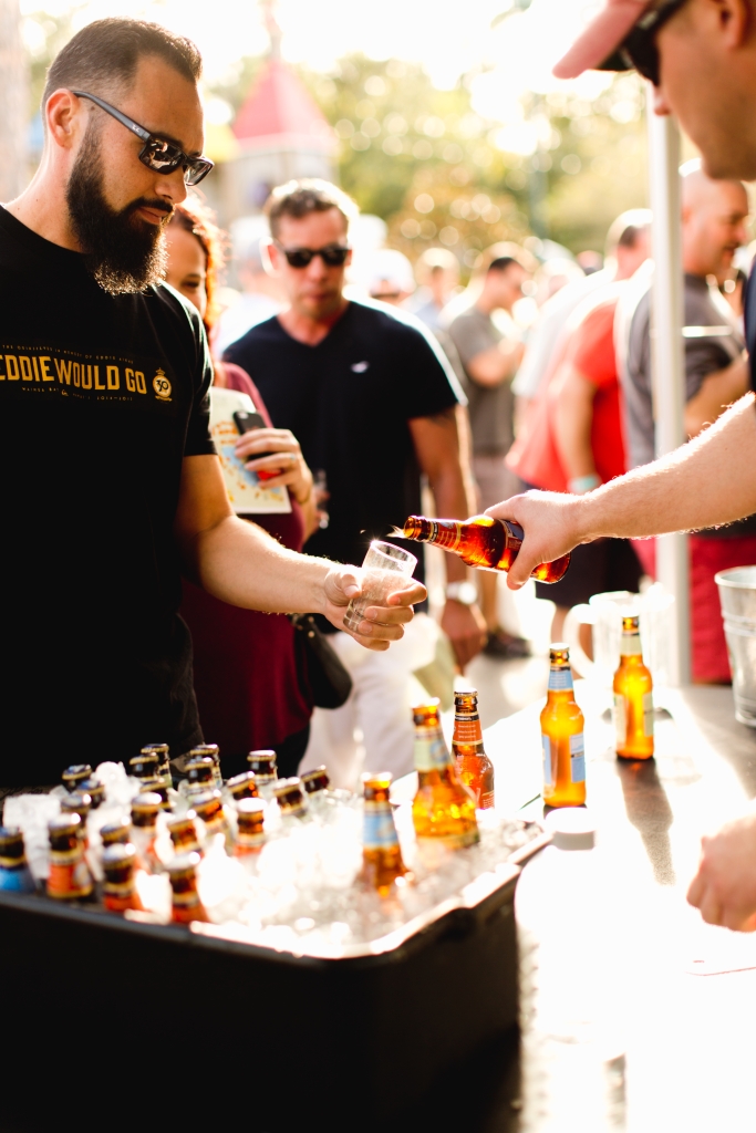 Pouring beer into glass at Beerfest