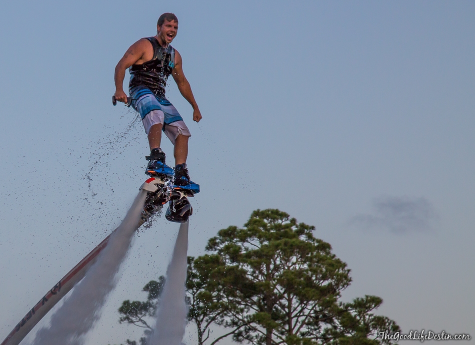 guy on fly-board above lagoon