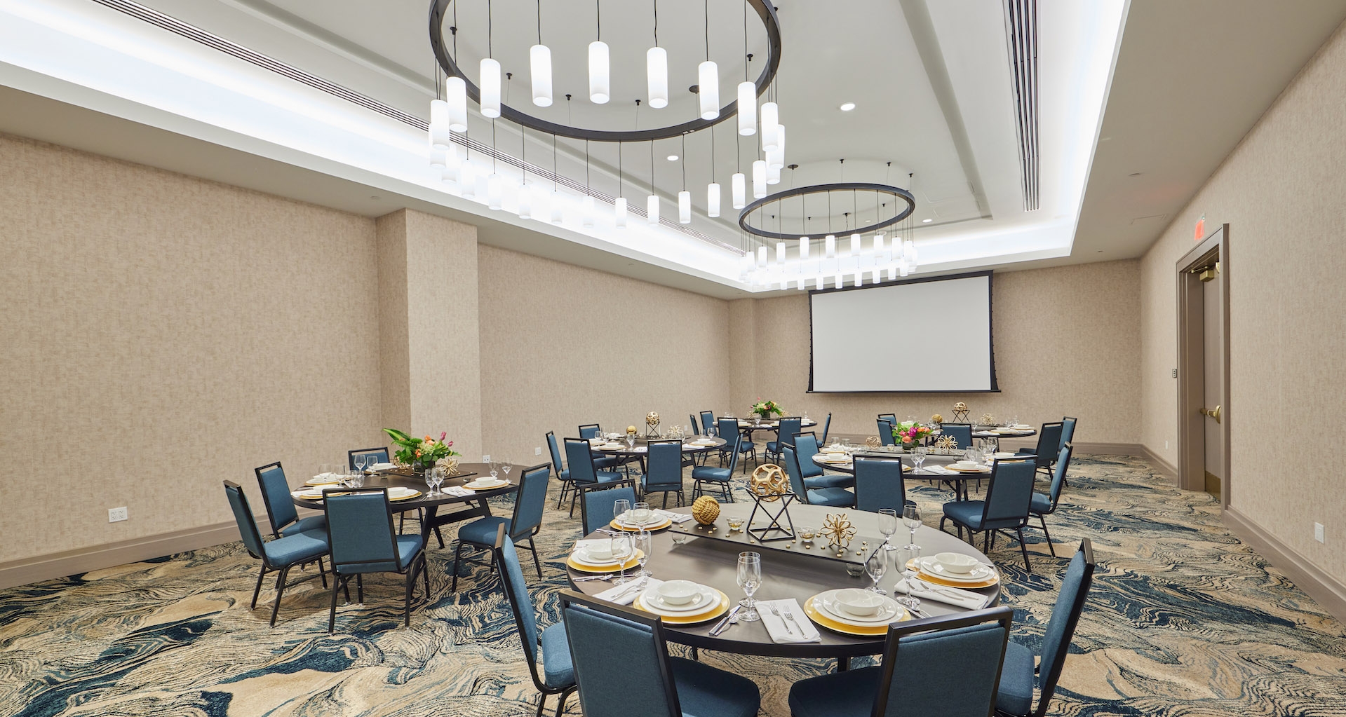 The Elderberry ballroom at Hotel Effie set up for a presentation.