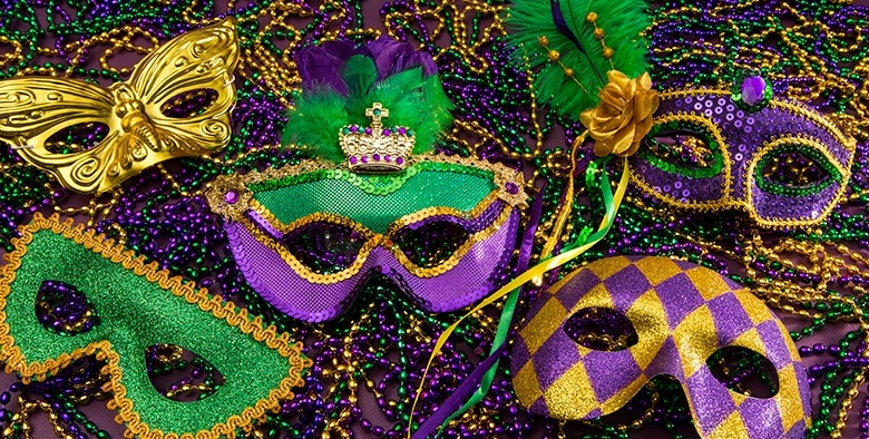 mardi gras mask and beads