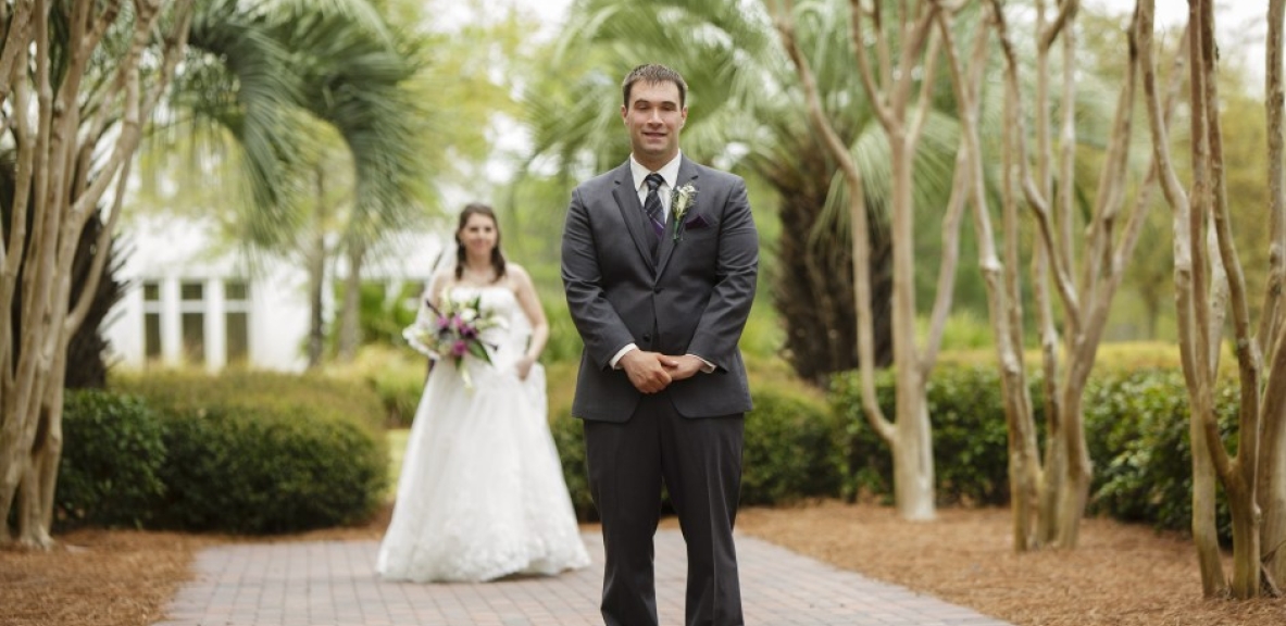 Deborah and James pose outside of Hotel Effie during their wedding.