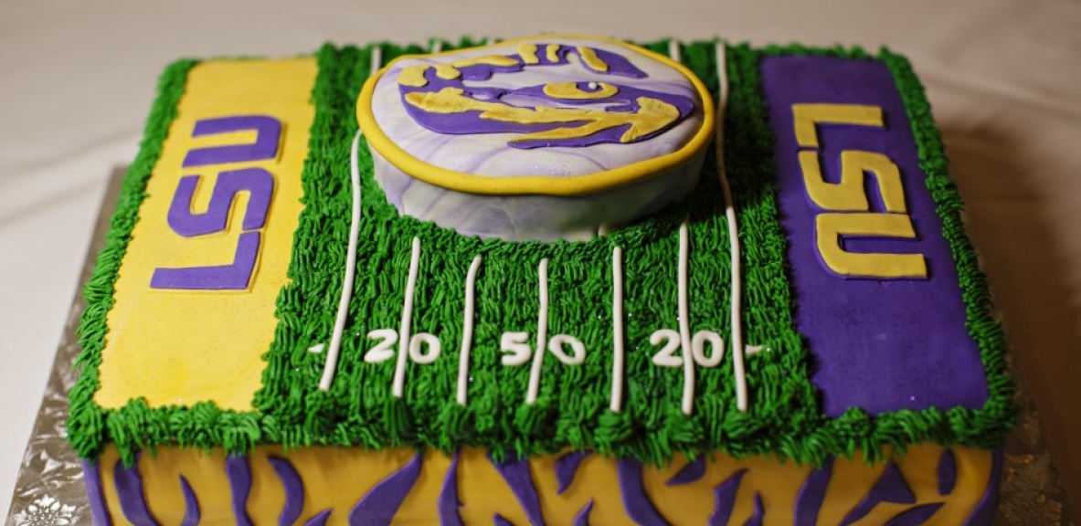 A wedding cake made to look like the LSU college football field.