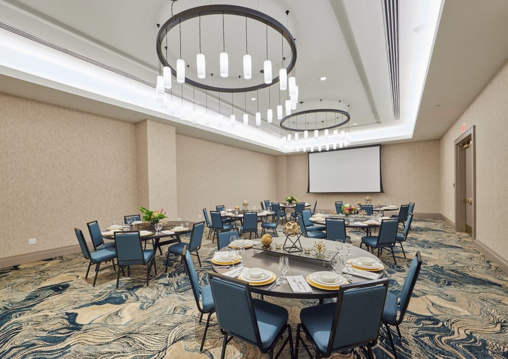 The Elderberry ballroom at Hotel Effie set up for a presentation.